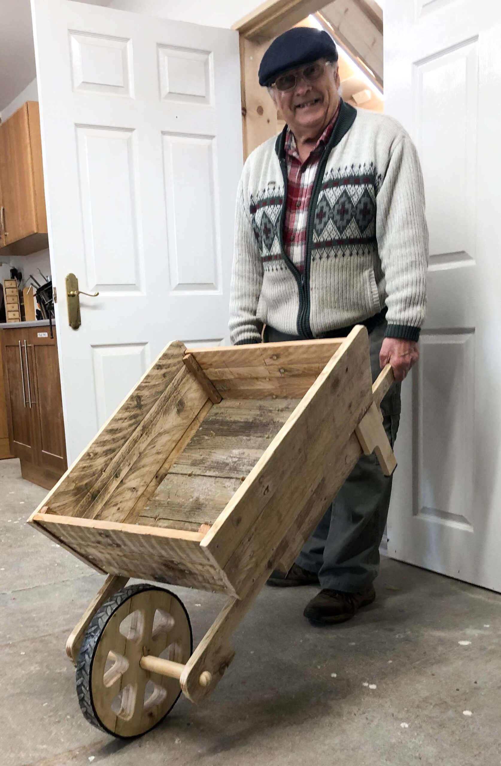 Graham taking finished wheelbarrow home